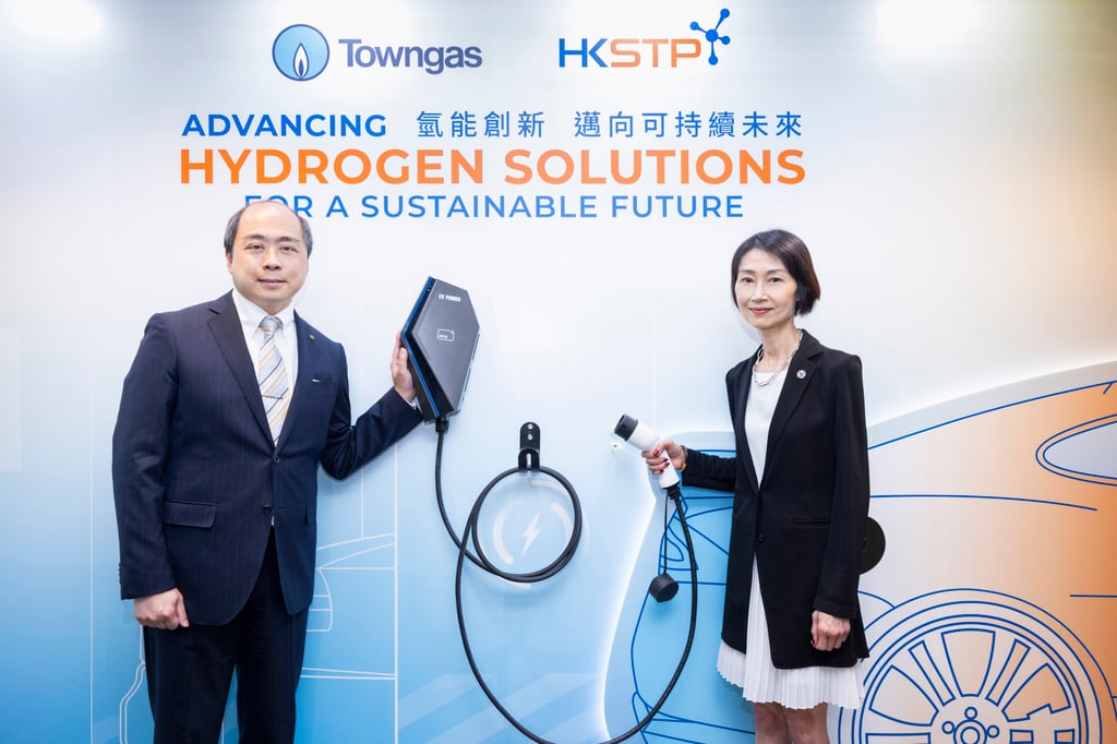 Mr Don Cheng Hill-kwong (left) and Filla Mak, chief operations officer of Hong Kong Science & Technology Parks, introduce the city’s first public electric vehicle automatic hydrogen charging system. Photo: Handout Mr Don Cheng Hill-kwong (left) and Filla Mak, chief operations officer of Hong Kong Science & Technology Parks, introduce the city’s first public electric vehicle automatic hydrogen charging system. Photo: Handout