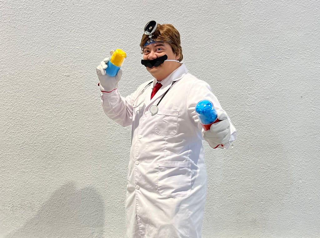 Teacher Jonathan Nguyen dressed as Dr Mario, one of his five outfits for the five-day fair. Photo: Ambrose Li