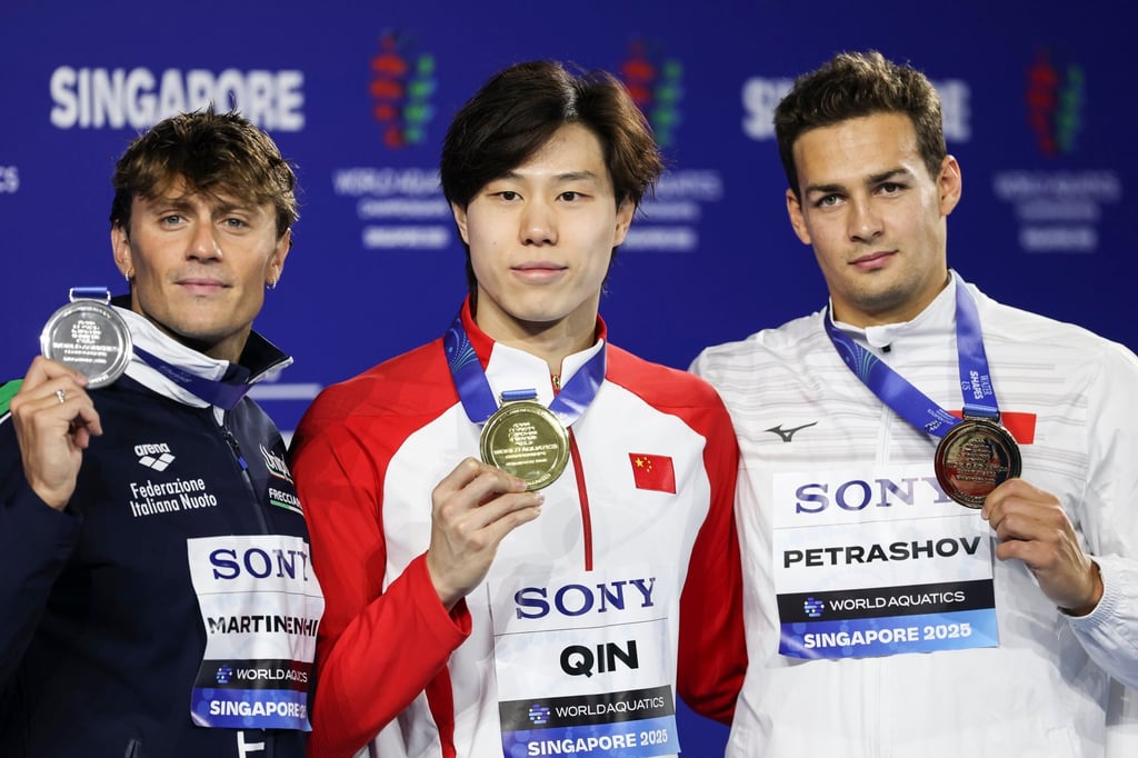 From left, Italy’s Nicolo Martinenghi, Qin Haiyang and Kyrgyzstan’s Denis Petrashov. Photo: EPA From left, Italy’s Nicolo Martinenghi, Qin Haiyang and Kyrgyzstan’s Denis Petrashov. Photo: EPA