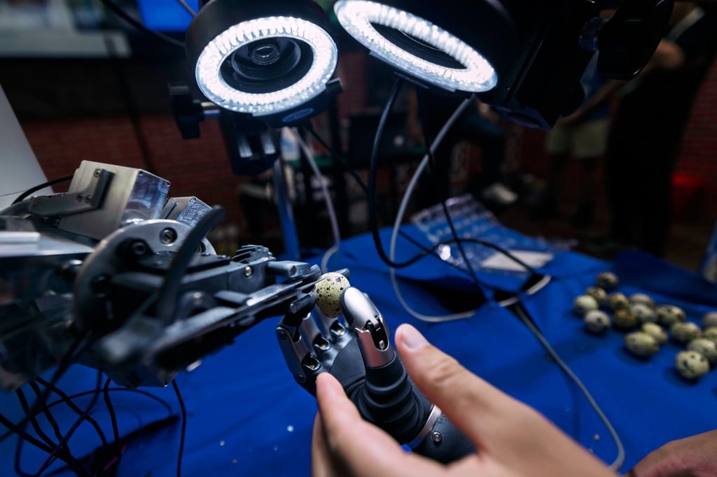 A microsurgery robot peels eggs at the WAIC. Photo: EPA A microsurgery robot peels eggs at the WAIC. Photo: EPA