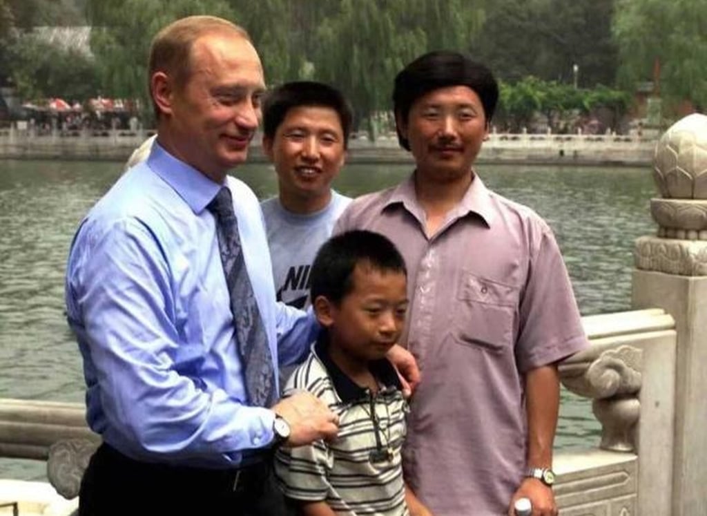 Peng Pai pictured with President Putin’s hands resting on his shoulders a quarter of a century ago in a Beijing park. Photo: handout Peng Pai pictured with President Putin’s hands resting on his shoulders a quarter of a century ago in a Beijing park. Photo: handout