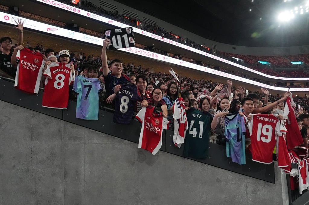 Arsenal supporters seek autographs during the training session at Kai Tak. Photo: Elson Li Arsenal supporters seek autographs during the training session at Kai Tak. Photo: Elson Li