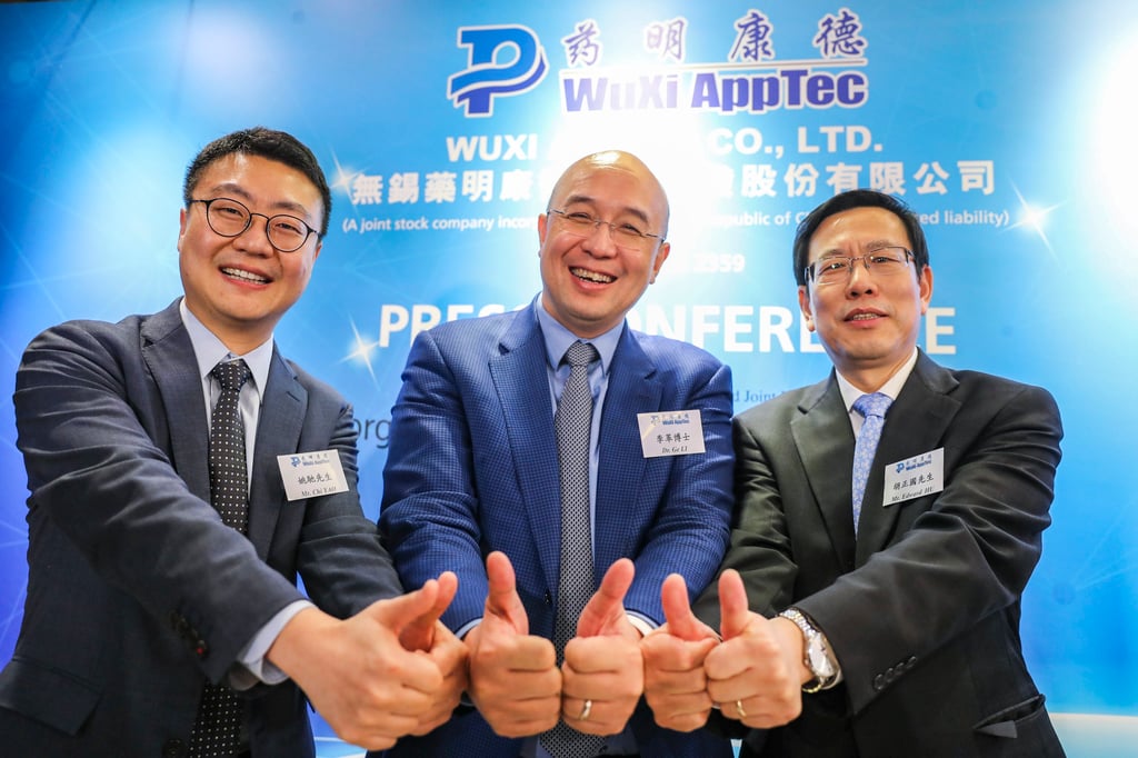 Wuxi AppTec’s executives (L-R): Joint Company Secretary Yao Chi, Chairman Dr. Li Ge and Co-Chief Executive Officer Edward Hu during the company’s IPO press conference on November 30, 2018. Photo: Edward Wong Wuxi AppTec’s executives (L-R): Joint Company Secretary Yao Chi, Chairman Dr. Li Ge and Co-Chief Executive Officer Edward Hu during the company’s IPO press conference on November 30, 2018. Photo: Edward Wong