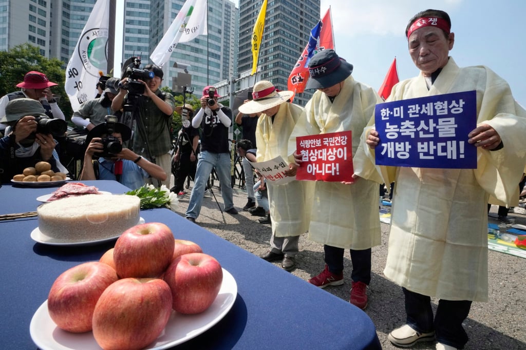 South Korean farmers hold a rally in Seoul on Monday demanding the government protect the country’s agricultural industry from US tariffs. Photo: AP