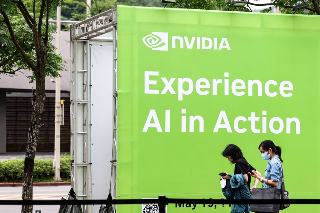 People walk past an Nvidia display advertisement in Taipei during the Computex 2025 trade show on May 19, 2025. Photo: AFP People walk past an Nvidia display advertisement in Taipei during the Computex 2025 trade show on May 19, 2025. Photo: AFP