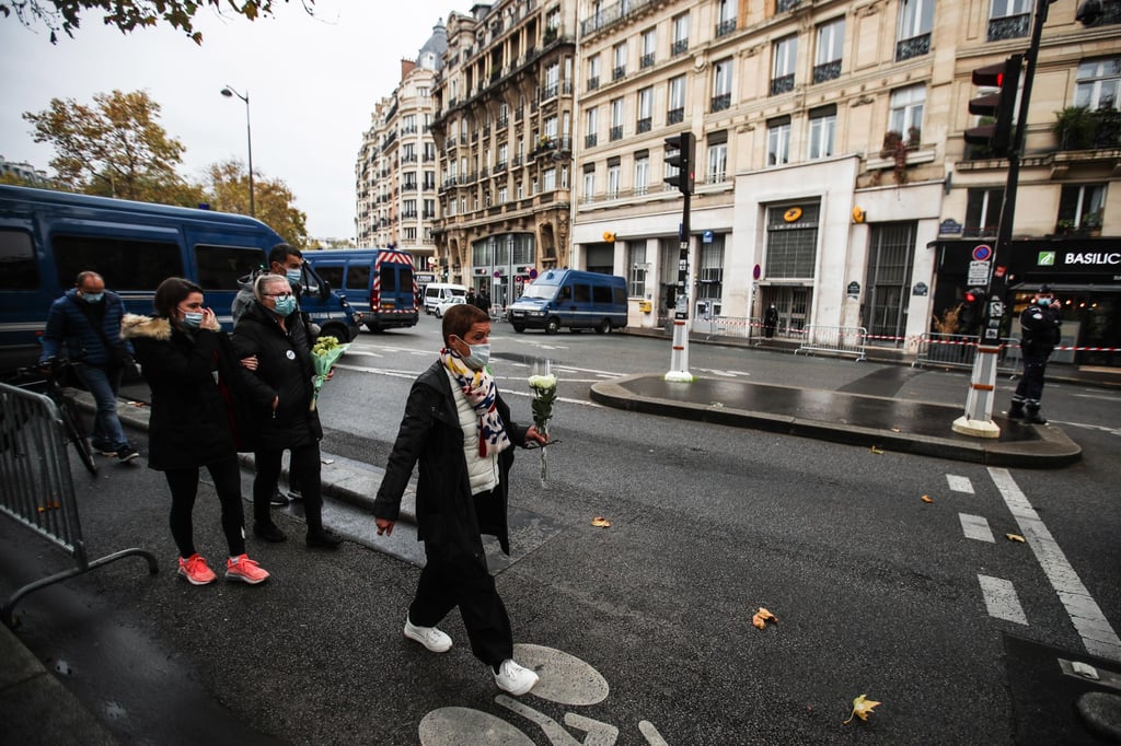 People remember the 5th anniversary of the November 2015 terror attack outside the Bataclan concert venue in Paris. Photo: EPA-EFE