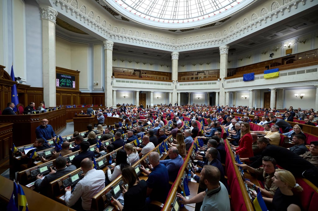 Ukrainian lawmakers vote for a new bill to restore the independence of the country’s anti-corruption agencies, at the parliament session hall in Kyiv on Thursday. Photo: AP