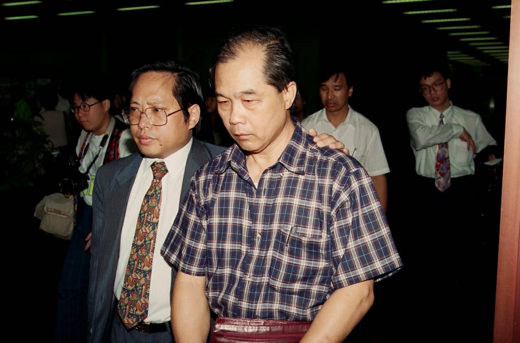 Mr Luk Pak-luen (right), the father of the victim, and his lawyer leave the Hong Kong Legal Department after requesting a review of the sentences for his daughter’s killers. Photo: SCMP Archives