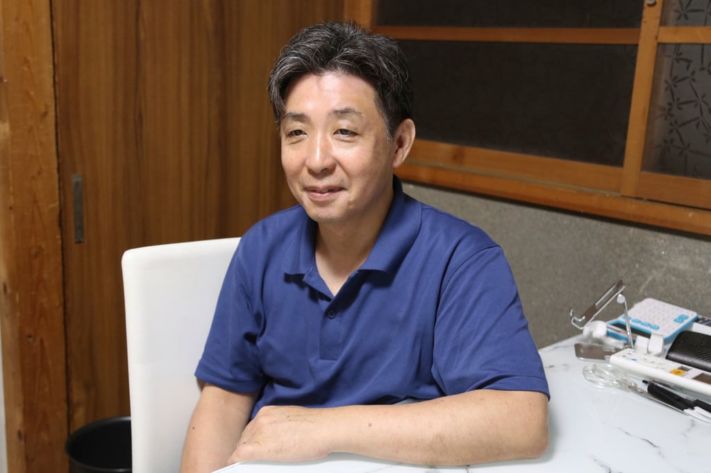 Hironori Fukuoka is the fourth-generation owner of Fukuoka Weaving, in Kyoto, Japan. He is looking at using AI to help with designs for kimono fabric. Photo: AP