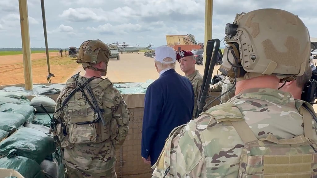 Donald Trump visits Fort Bragg, with the containerised system visible in the background. Photo: X/Dan Scavino