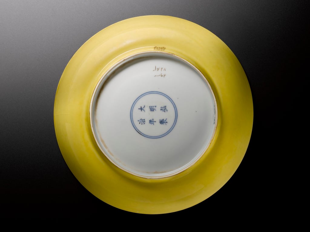 Yellow enamel porcelain dish from Jingdezhen’s imperial kilns. Ming dynasty, Hongzhi period (1488-1505); collected by Jahangir. Photo: Victoria and Albert Museum Yellow enamel porcelain dish from Jingdezhen’s imperial kilns. Ming dynasty, Hongzhi period (1488-1505); collected by Jahangir. Photo: Victoria and Albert Museum