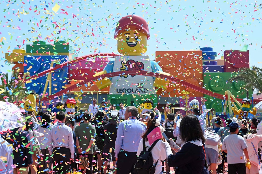 People attend the grand opening ceremony of the Legoland Shanghai Resort, the world’s largest Legoland theme park, in Shanghai on July 5. Photo: AFP