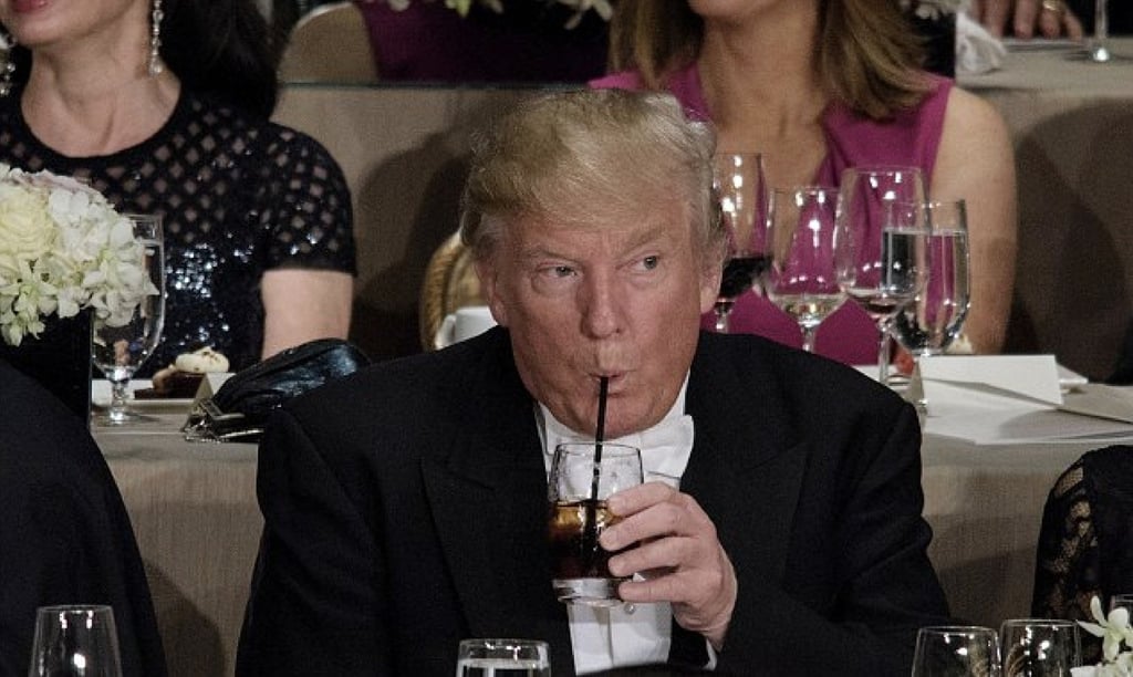 Donald Trump drinks a Diet Coke at the Al Smith Memorial Foundation Dinner in New York in 2016. Photo: AFP via Getty Images