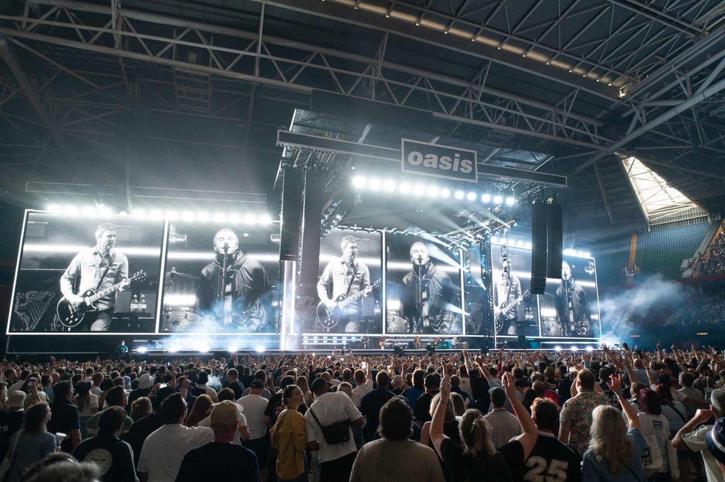 Oasis performing in Cardiff last month. Photo: AFP