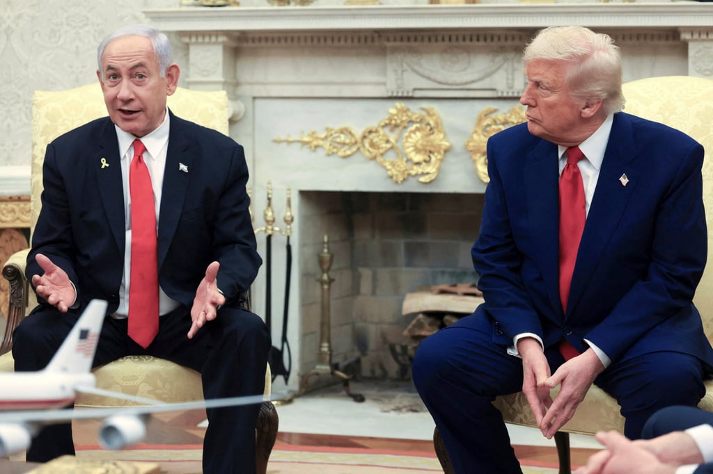President Donald Trump (right) listens as Israel’s Prime Minister Benjamin Netanyahu speaks in the Oval Office in April. Photo: AP