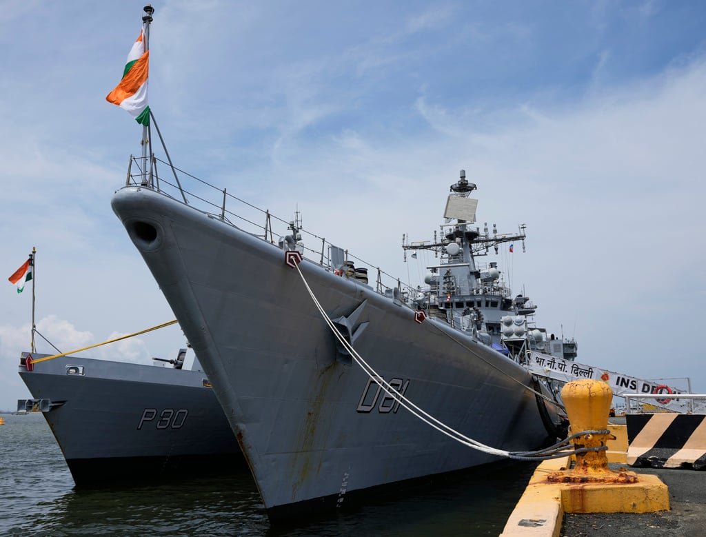 Indian navy ships INS Delhi (right), a guided-missile destroyer, and INS Kiltan, an anti-submarine warfare corvette, dock at the port in Manila on Friday. Photo: AP