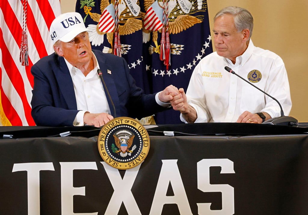 US President Donald Trump and Texas Governor Greg Abbott. File photo: The Dallas Morning News via TNS