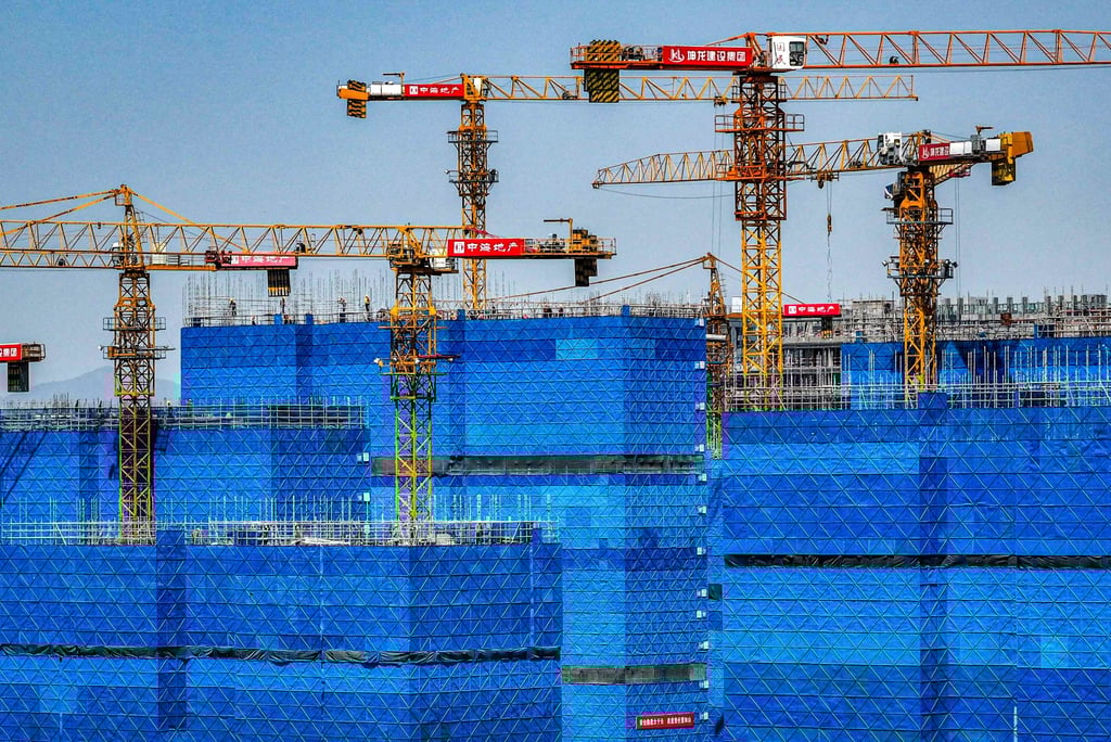 Cranes on residential buildings under construction by the Chinese property developer China Overseas in Nanjing, in eastern China’s Jiangsu province on April 25, 2025. Photo: AFP Cranes on residential buildings under construction by the Chinese property developer China Overseas in Nanjing, in eastern China’s Jiangsu province on April 25, 2025. Photo: AFP