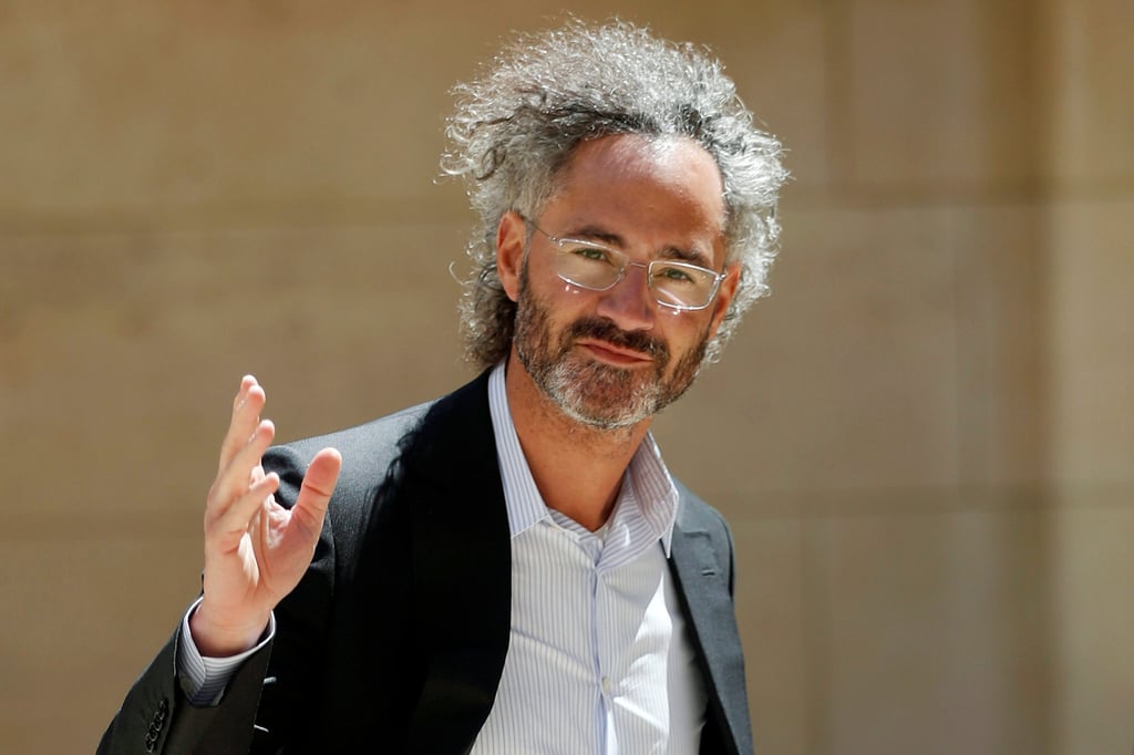 In this May 15, 2019, file photo, Palantir CEO Alex Karp arrives for the Tech for Good summit in Paris. Photo: AP