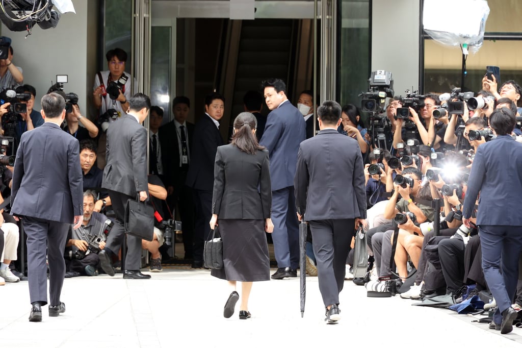 Kim Keon-hee (centre) enters the special prosecutor’s office in Seoul on Wednesday. Photo: Yonhap/EPA Kim Keon-hee (centre) enters the special prosecutor’s office in Seoul on Wednesday. Photo: Yonhap/EPA