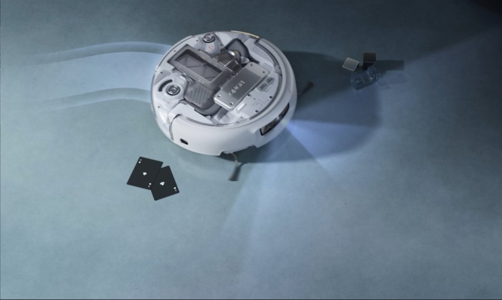 DJI’s robot cleaner Romo can avoid thin items like playing cards. Photo: Handout