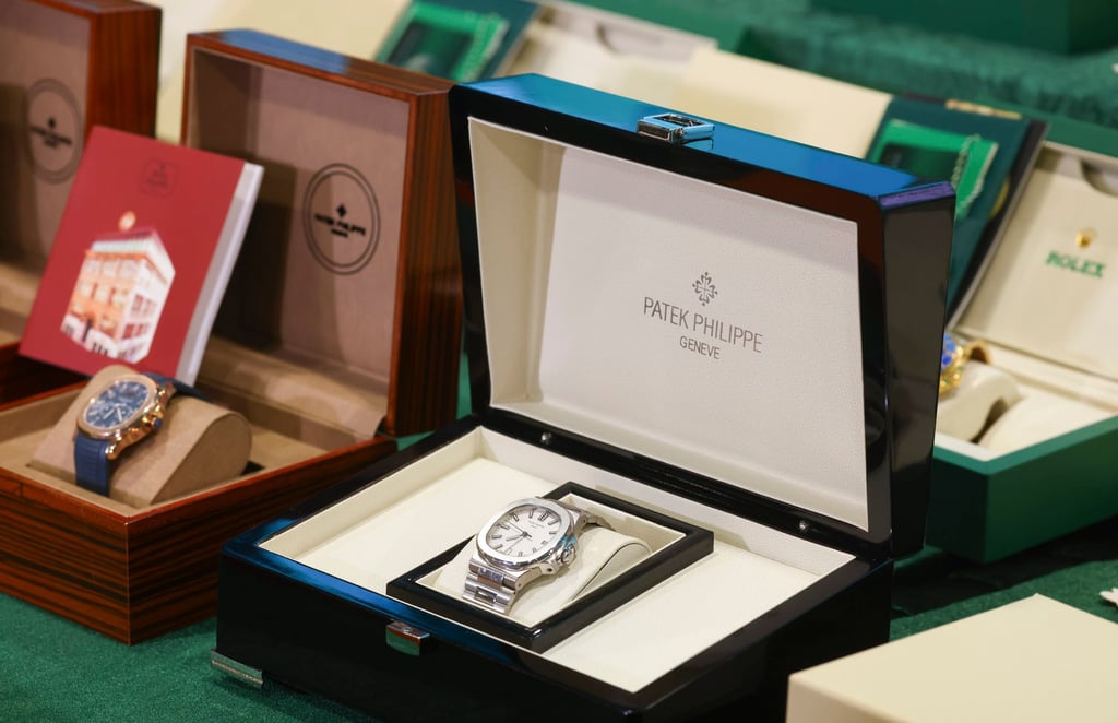 Fake luxury watches were among the 67,000 items Photo: Dickson Lee