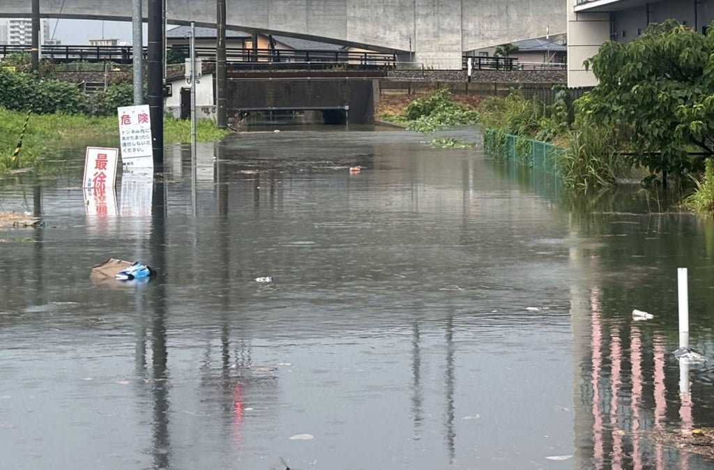 A road is seen inundated with water after torrential rain hit Kanazawa in the central Japanese prefecture of Ishikawa on Thursday. Photo: Kyodo
