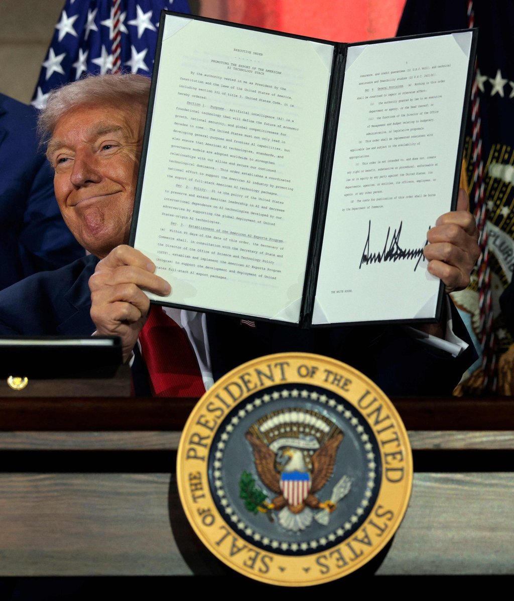 US President Donald Trump displays a signed executive order at an AI summit in Washington on July 23. Photo: Getty Images/AFP US President Donald Trump displays a signed executive order at an AI summit in Washington on July 23. Photo: Getty Images/AFP