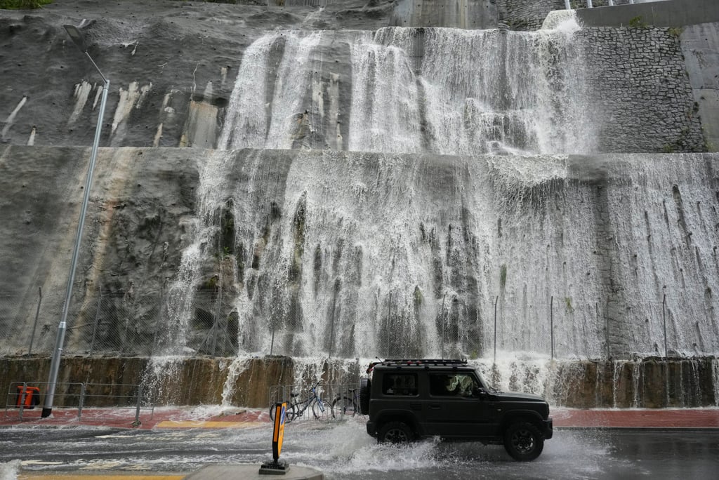 Waterfalls formed along a hillside on Yiu Hing Road in Shau Kei Wan during the torrential downpours. Photo: Sam Tsang