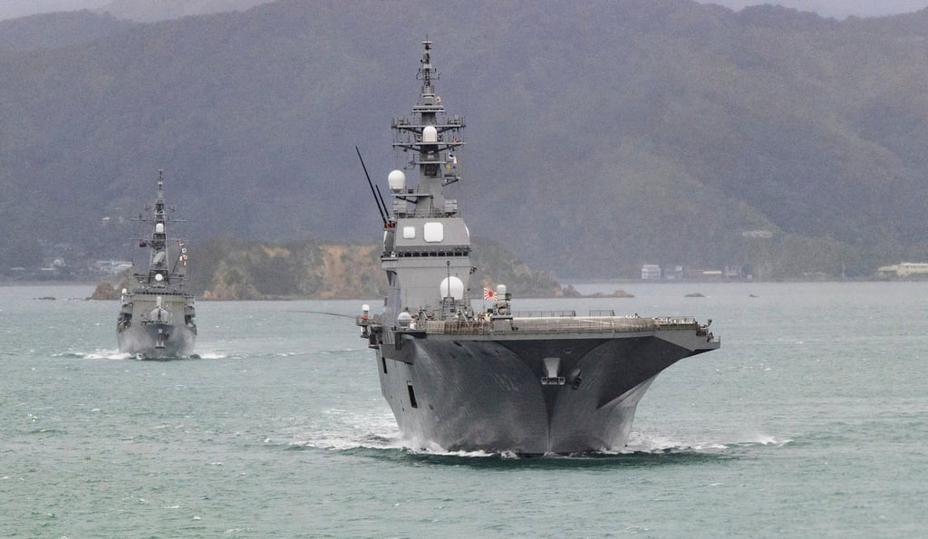 Two ships from the Japan Maritime Self-Defence Force, JS Ise and destroyer JS Suzunami, sail into Wellington, New Zealand, to begin a three-day ceremonial port visit on Friday. Photo: Stuff/AP