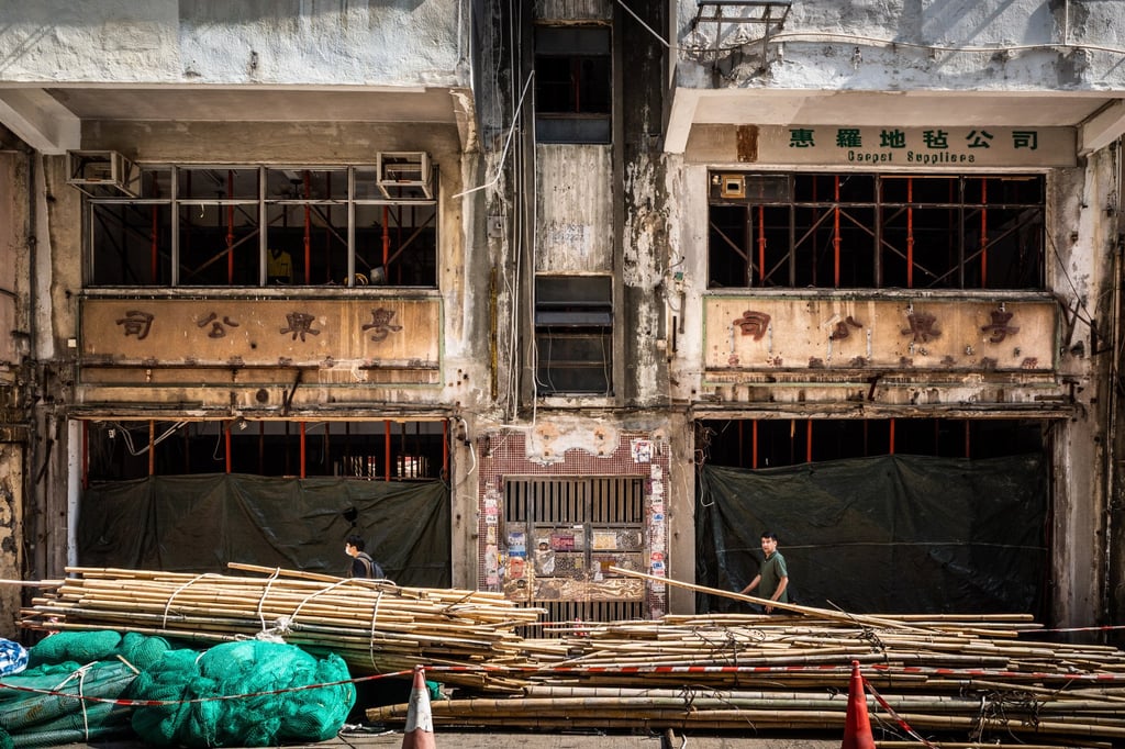 Ghost signs captured in April 2023 at 15 Nanking Street, Jordan, the former location of the Yuet Hing Company, a dealer in electronic scales. The company has since relocated about seven blocks west, leaving behind the signs by calligrapher Huang Weichang. Photo: Ben Marans Ghost signs captured in April 2023 at 15 Nanking Street, Jordan, the former location of the Yuet Hing Company, a dealer in electronic scales. The company has since relocated about seven blocks west, leaving behind the signs by calligrapher Huang Weichang. Photo: Ben Marans