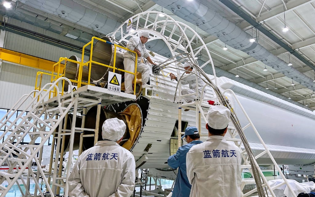 Workers complete the final assembly of a launch vehicle . Photo: LandSpace