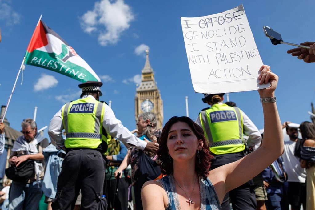 Supporters of Palestine Action attend a mass protest organised by the Defend Our Juries group as part of their campaign to end the proscription of Palestine Action, in London on Saturday. Photo: EPA