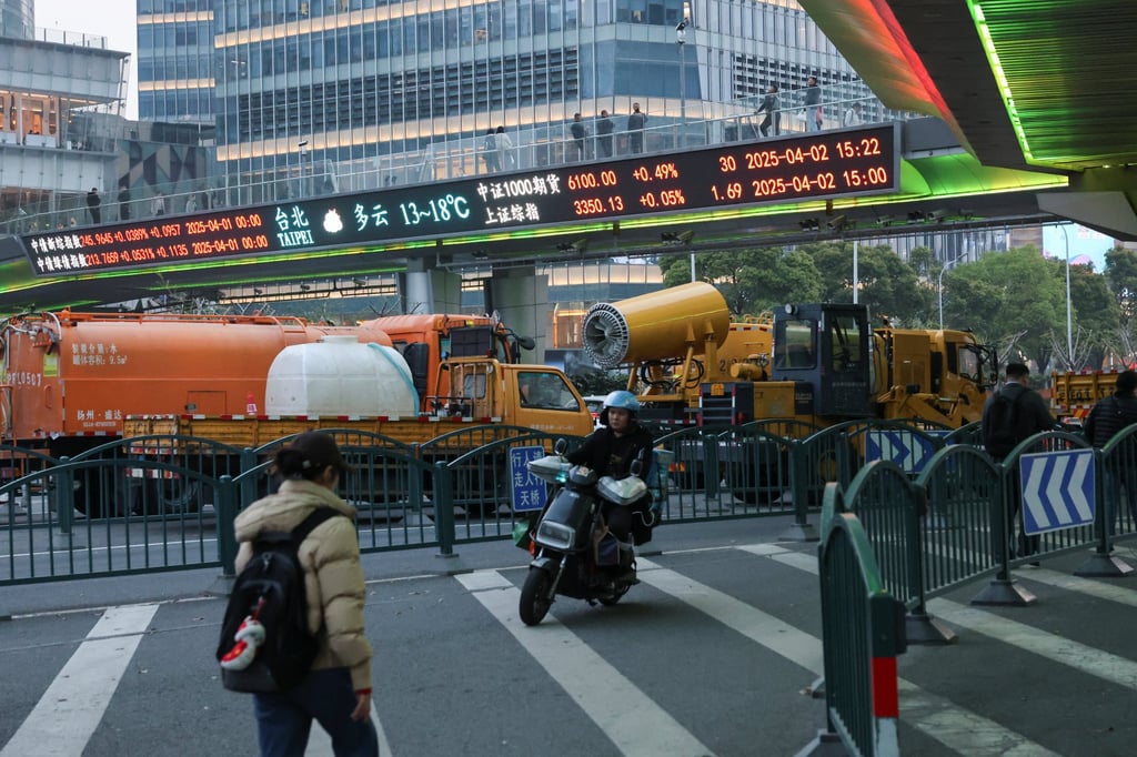 An electronic board shows stock information at the Lujiazui financial district in Shanghai on April 2, 2025. Photo: Reuters An electronic board shows stock information at the Lujiazui financial district in Shanghai on April 2, 2025. Photo: Reuters
