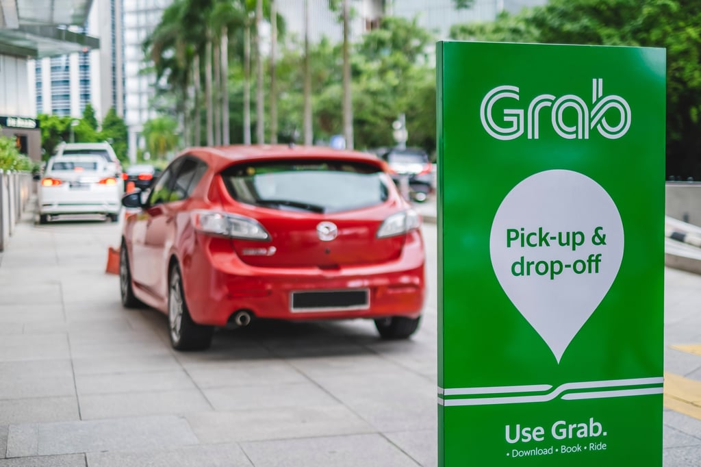 A Grab car pick-up and drop-off point in Kuala Lumpur. Photo: Shutterstock A Grab car pick-up and drop-off point in Kuala Lumpur. Photo: Shutterstock