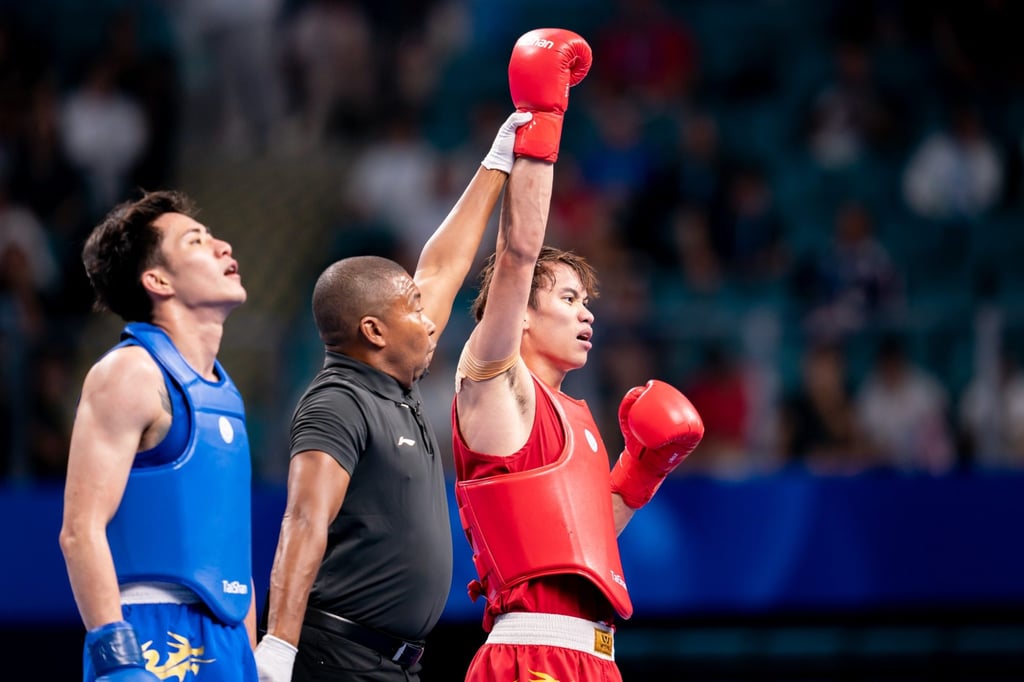 Hong Kong’s Cheung Yat-lam is declared the winner over Chinese Taipei’s Zhang Huan-yi. Photo: SF&OC