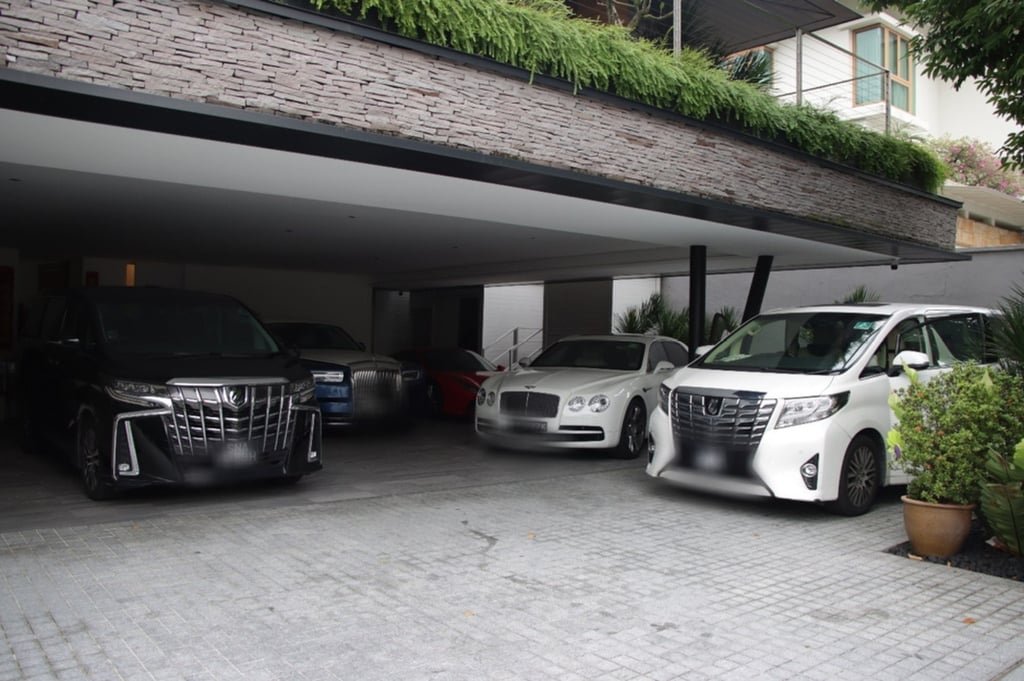 Vehicles seized during an anti-money laundering raid in Singapore in August 2023). Photo: EPA-EFE/Singapore Police Force