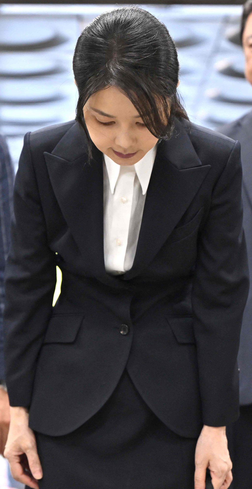 South Korea’s former first lady Kim Keon-hee bows as she arrives at the Seoul Central District Court on Tuesday. Photo: AFP South Korea’s former first lady Kim Keon-hee bows as she arrives at the Seoul Central District Court on Tuesday. Photo: AFP