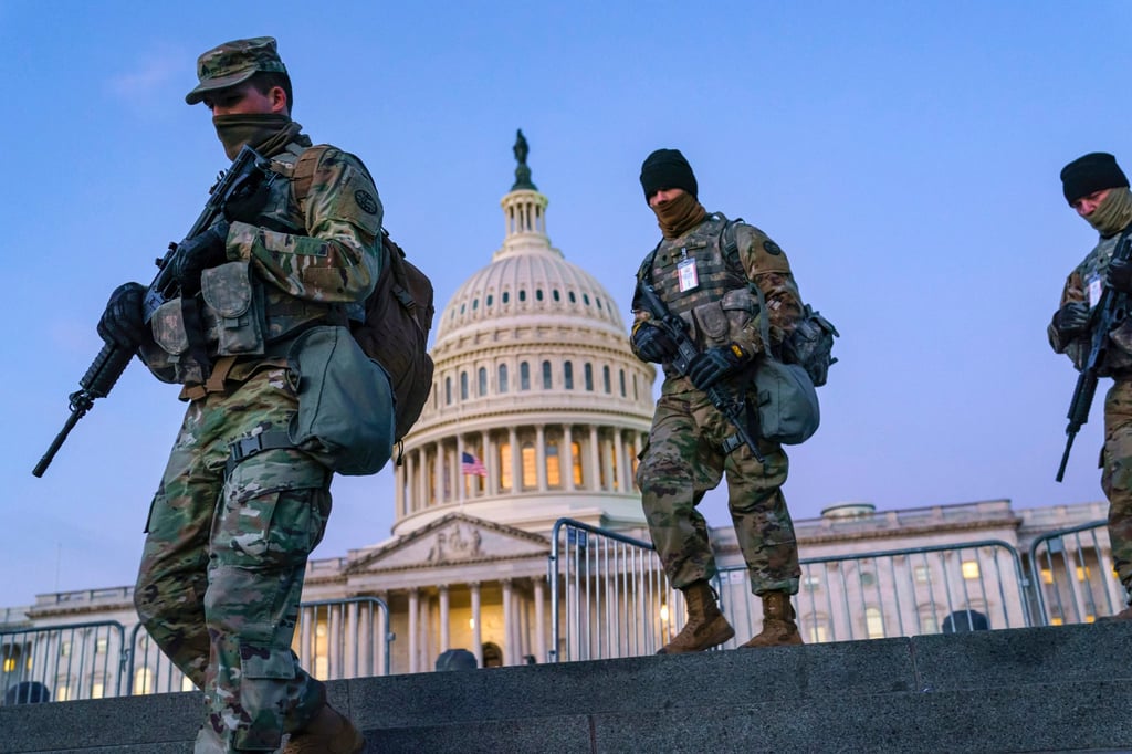 National Guard troops helped provide security on Capitol Hill in Washington in 2021, before Joe Biden was sworn in as president. File photo: AP National Guard troops helped provide security on Capitol Hill in Washington in 2021, before Joe Biden was sworn in as president. File photo: AP