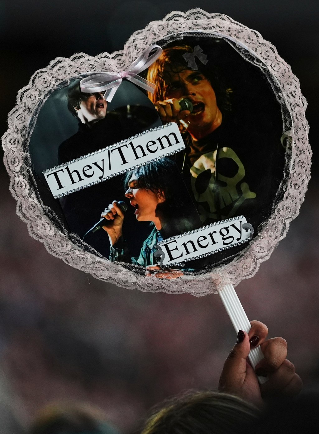 A fan holds a sign for Gerard Way of My Chemical Romance during the band’s opening night on July 11 in Seattle. Photo: AP A fan holds a sign for Gerard Way of My Chemical Romance during the band’s opening night on July 11 in Seattle. Photo: AP