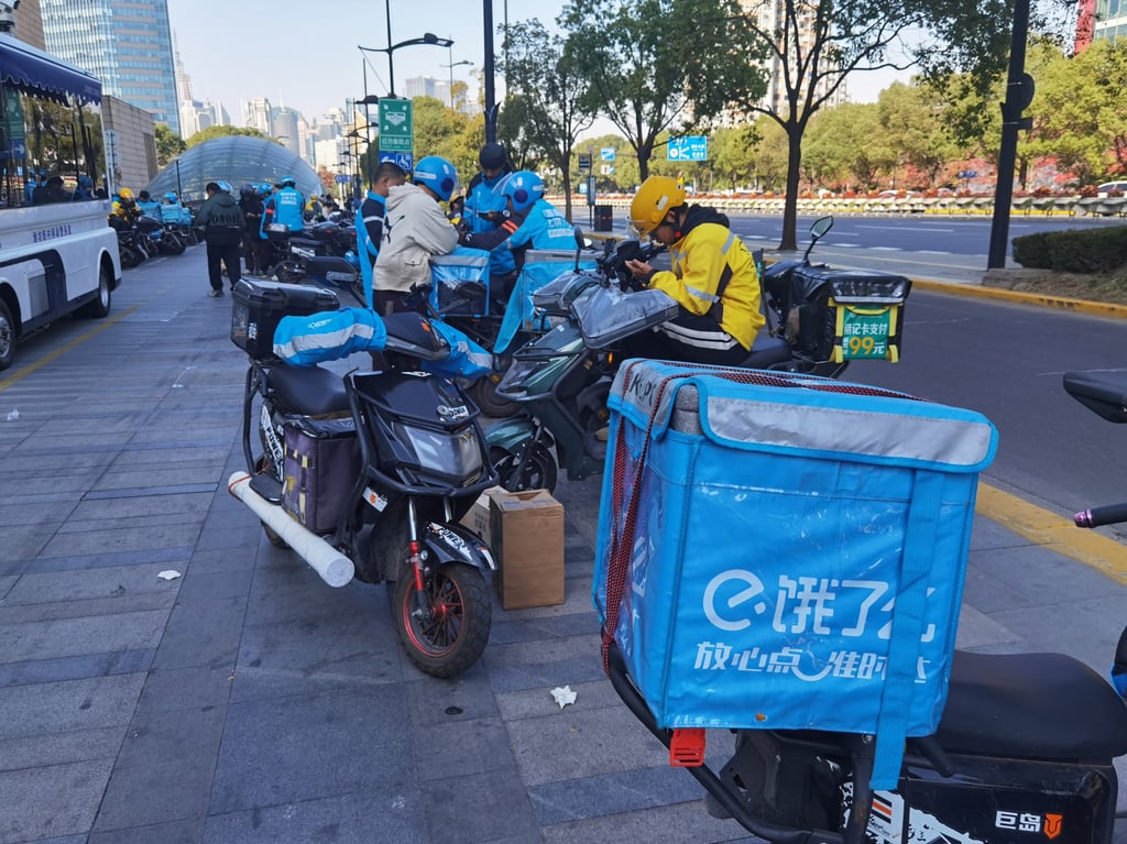 Delivery riders on the streets of Shanghai on November 29, 2023. Photo: Shutterstock Delivery riders on the streets of Shanghai on November 29, 2023. Photo: Shutterstock