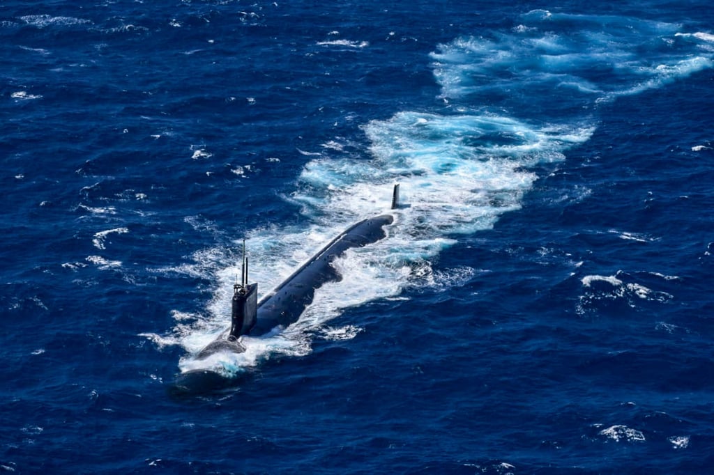 A US nuclear submarine is seen during military exercises 70 nautical miles off Cartagena, Colombia, on February 28, 2022. US President Donald Trump said he had ordered two nuclear submarines to be positioned in the “appropriate regions” in response to threats from former Russian president Dmitry Medvedev. Photo: Colombian National Navy / AFP