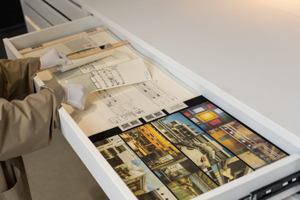 Drawings and photographs of Hong Kong’s municipal services buildings, at the Venice Biennale of Architecture 2025. Photo: Oliver Law