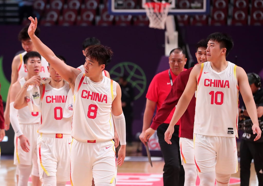 Chinese captain Zhao Rui (left) and Wang Junjie (right) thank the crowd after their win. Photo: Xinhua Chinese captain Zhao Rui (left) and Wang Junjie (right) thank the crowd after their win. Photo: Xinhua