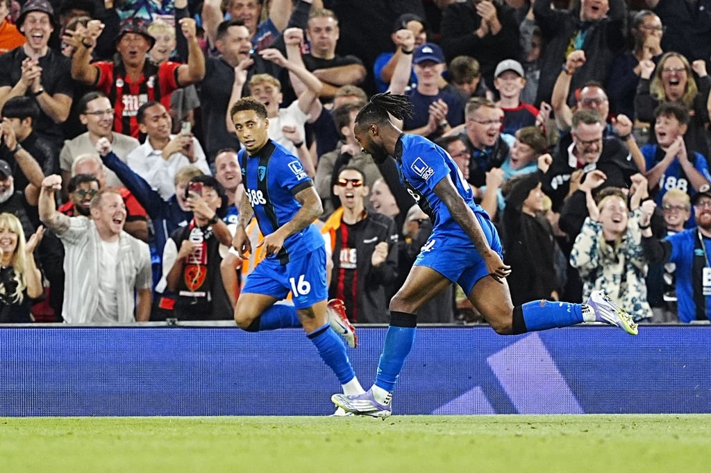Antoine Semenyo (right) celebrates after scoring his second goal against Liverpool. Photo: dpa