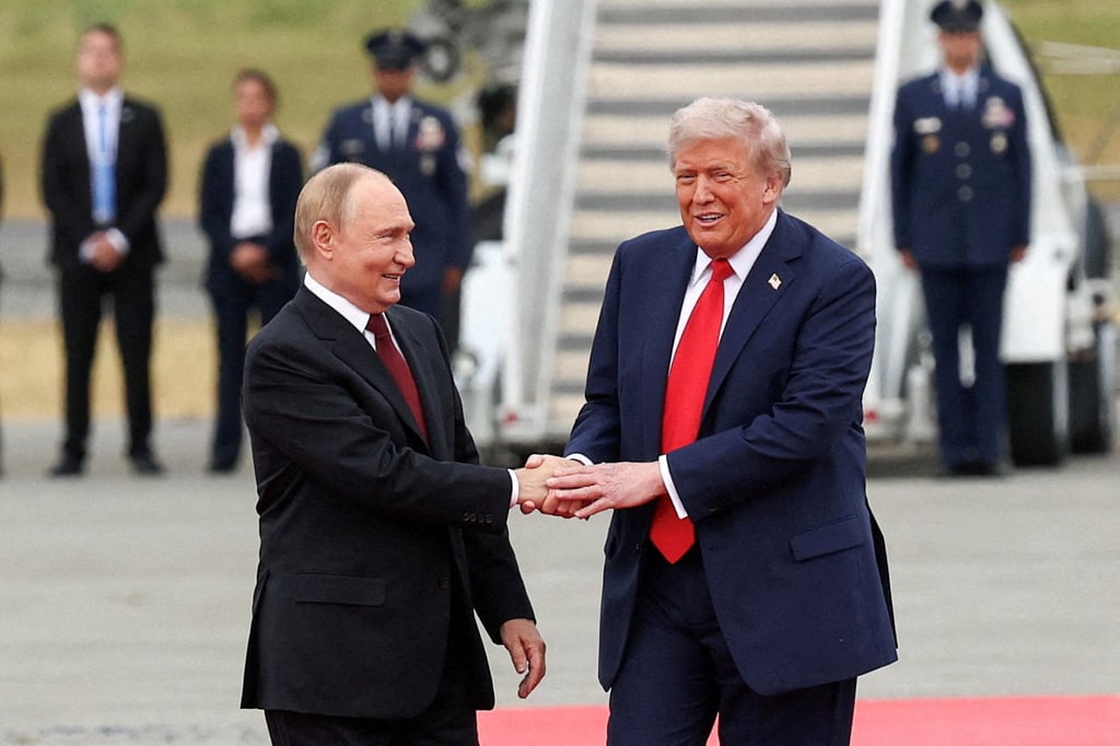 US President Donald Trump shakes hands with Russian President Vladimir Putin in Alaska on Friday. Photo: Reuters US President Donald Trump shakes hands with Russian President Vladimir Putin in Alaska on Friday. Photo: Reuters