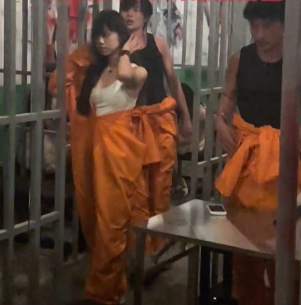 Orange jumpsuits are the order of the day in China’s growing number of jail-themed bars. Photo: RedNote Orange jumpsuits are the order of the day in China’s growing number of jail-themed bars. Photo: RedNote