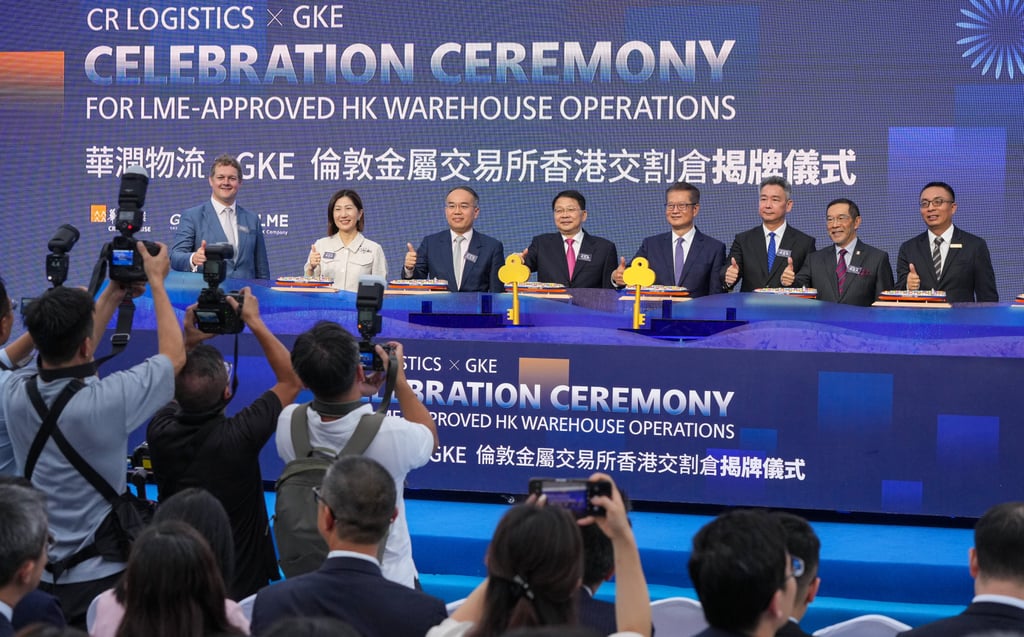 From left to right: LME CEO Matthew Chamberlain; HKEX CEO Bonnie Chan; Christopher Hui Ching-yu, Secretary for Financial Services and the Treasury; Yin Zhonghua, Deputy Director of the Liaison Office; Paul Chan Mo-po, Financial Secretary; Han Yuewei, deputy general manager of China Resources; HKEX chairman Carlson Tong; and Jason Li, CEO of GKE Metal Group. Photo: May Tse