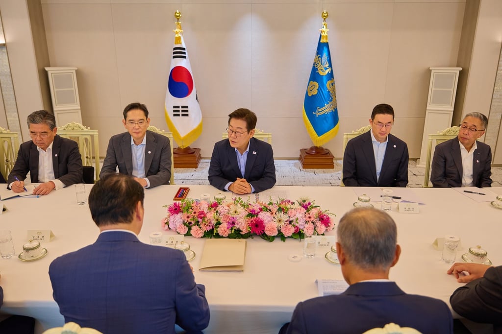 South Korean President Lee Jae-myung holds a meeting with heads of major business conglomerates at the presidential office in Seoul on Tuesday. Photo: Yonhap/EPA South Korean President Lee Jae-myung holds a meeting with heads of major business conglomerates at the presidential office in Seoul on Tuesday. Photo: Yonhap/EPA