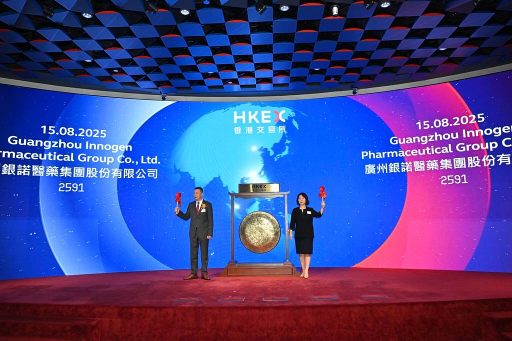 Guangzhou Innogen Pharmaceutical Group’s founder and chairman Wang Qinghua (left) and chief financial officer Jiang Fan during the company’s trading debut on the Hong Kong stock exchange on August 15, 2025. Photo: InvestHK Guangzhou Innogen Pharmaceutical Group’s founder and chairman Wang Qinghua (left) and chief financial officer Jiang Fan during the company’s trading debut on the Hong Kong stock exchange on August 15, 2025. Photo: InvestHK